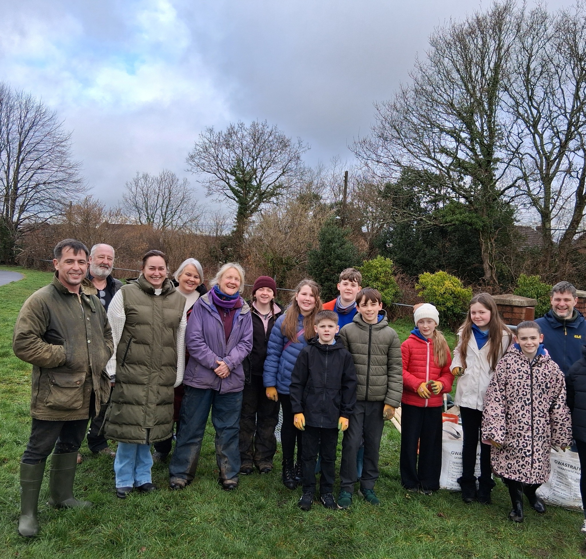 Planting fruit trees in Golden Grove Park